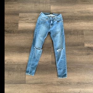 Jeans with holes on the knees